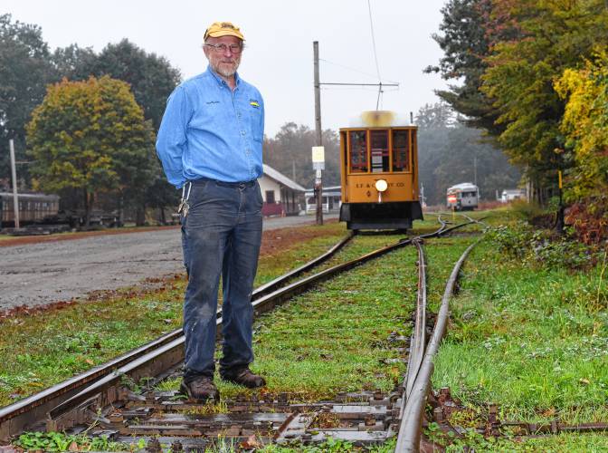 Shelburne Falls Trolley Museum President Sam Bartlett on the tracks with Trolley No. 10. The museum received $10,000 to renovate a section of railway track; replace all ties and timbers; remove the old ballast and replace it with new ballast; and raise, level and align the railway structure for smoother, safer operation.