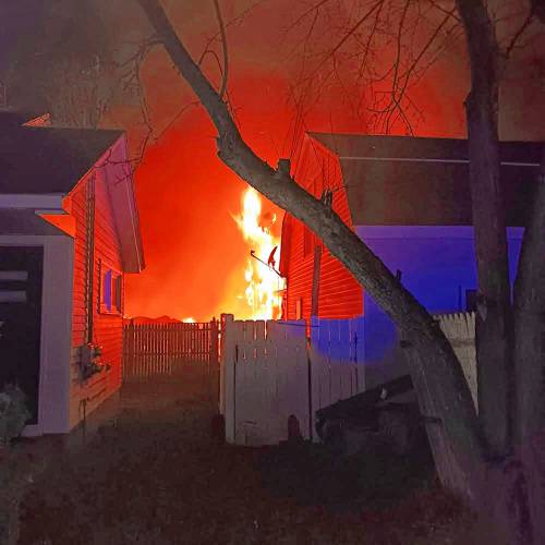 Upon arriving at a house fire on West River Street on Wednesday, the Orange Fire Department found heavy fire in the rear of the home.