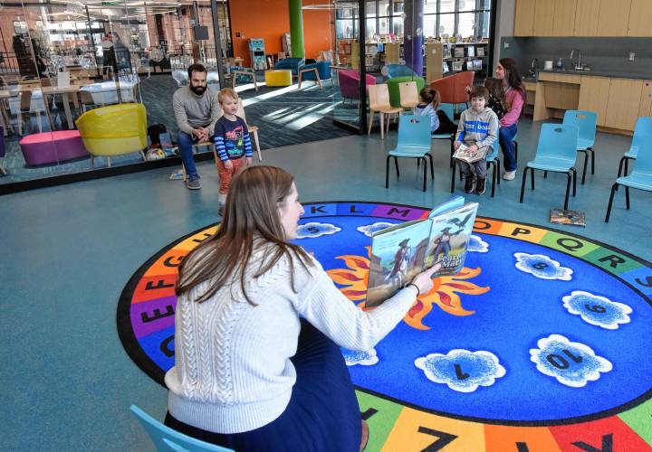 Children’s Librarian Ellen Lavoie reads “Fearless Mary” to those gathered in the Children’s Room at the Greenfield Public Library last week during World Read Aloud Day.
