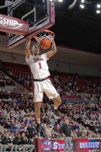 UMass sophomore forward Daniel Hankins-Sanford (1) jams home fast-break dunk in the first half of the Minutemen’s 75-67 loss to St. Bonaventure on Saturday afternoon at the Mullins Center. UMass sophomore forward Daniel Hankins-Sanford (1) jams home fast-break dunk in the first half of the Minutemen’s 75-67 loss to St. Bonaventure on Saturday afternoon at the Mullins Center.