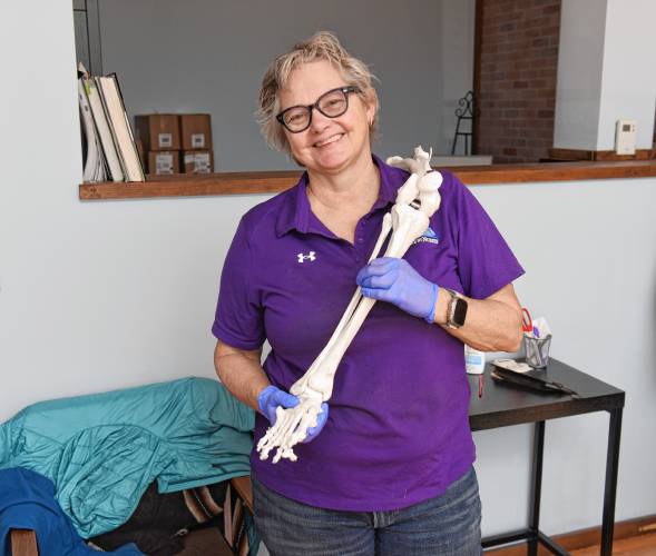 Registered nurse Kate Clayton-Jones in the new offices of FootCare by Nurses at 40 School St. in Greenfield.