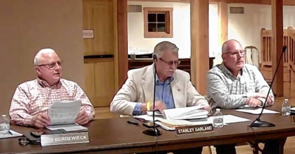 From left, Bernardston Selectboard members Ken Bordewieck, Stanley Garland and Brian Keir during Annual Town Meeting on Monday at The Farm Table’s events barn. From left, Bernardston Selectboard members Ken Bordewieck, Stanley Garland and Brian Keir during Annual Town Meeting on Monday at The Farm Table’s events barn.