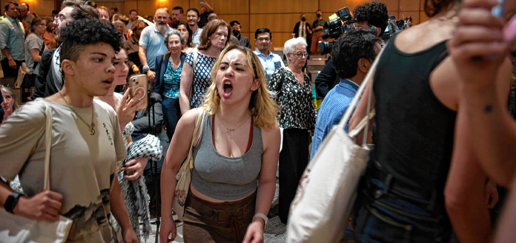 University of Massachusetts Amherst students chant and yell as they leave the Mahar Auditorium after a Faculty Senate meeting on May 14 where Chancellor Javier Reyes defended the crackdown on student protesters on May 7, when 134 people were arrested. University of Massachusetts Amherst students chant and yell as they leave the Mahar Auditorium after a Faculty Senate meeting on May 14 where Chancellor Javier Reyes defended the crackdown on student protesters on May 7, when 134 people were arrested.