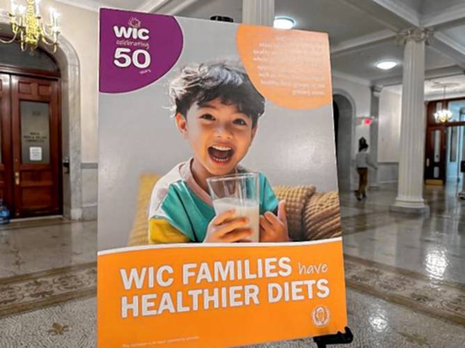 A poster celebrates the 50th anniversary of the Bay State's WIC program offering nutrition assistance to women, infants, and young children. A poster celebrates the 50th anniversary of the Bay State's WIC program offering nutrition assistance to women, infants, and young children.