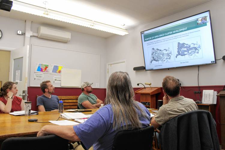 Planning Board and Economic Development Committee members deliberate over proposed amendments to the city’s cluster development ordinance on Thursday. Planning Board and Economic Development Committee members deliberate over proposed amendments to the city’s cluster development ordinance on Thursday.