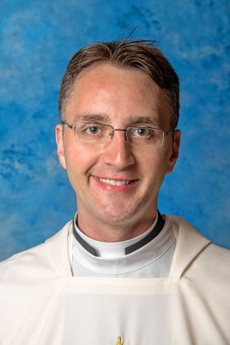 The Rev. Michael Pierz, the pastor of Blessed Trinity Parish in Greenfield, has been named the next chancellor of the Roman Catholic Diocese of Springfield. The Rev. Michael Pierz, the pastor of Blessed Trinity Parish in Greenfield, has been named the next chancellor of the Roman Catholic Diocese of Springfield.
