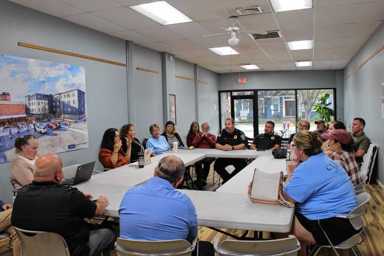 Greenfield Police officers discuss downtown safety with members of the Greenfield Business Association at its Tuesday night roundtable. Greenfield Police officers discuss downtown safety with members of the Greenfield Business Association at its Tuesday night roundtable.