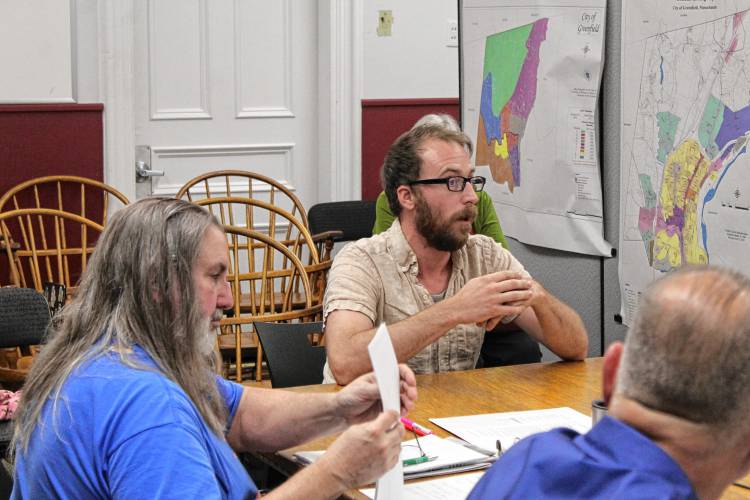 At-Large City Councilor John Garrett discusses a series of proposed zoning amendments with Greenfield Planning Board members on Thursday. At-Large City Councilor John Garrett discusses a series of proposed zoning amendments with Greenfield Planning Board members on Thursday.
