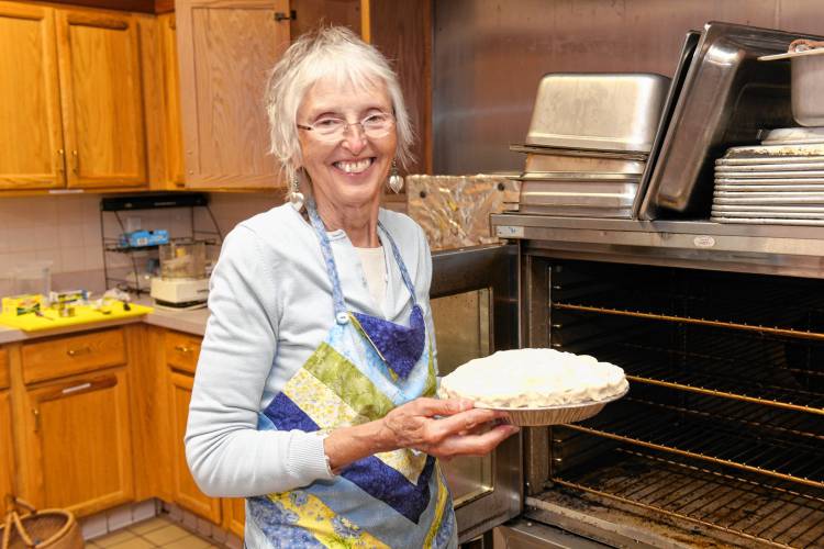 Ella Ingraham makes apple pies in the kitchen of the Episcopal Church of Saints James and Andrew in Greenfield.