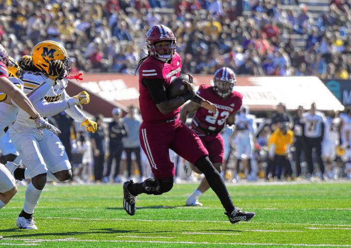 UMass quarterback Taisun Phommachanh carries the ball against Missouri earlier this season. The sixth-year quarterback is out for the season after suffering an injury against Mississippi State, according to head coach Don Brown. UMass quarterback Taisun Phommachanh carries the ball against Missouri earlier this season. The sixth-year quarterback is out for the season after suffering an injury against Mississippi State, according to head coach Don Brown.