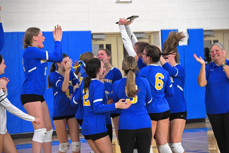 The Mohawk Trail volleyball team celebrates after winning the Western Mass. Class D championship over Lee at West Springfield High School Saturday. The Mohawk Trail volleyball team celebrates after winning the Western Mass. Class D championship over Lee at West Springfield High School Saturday.