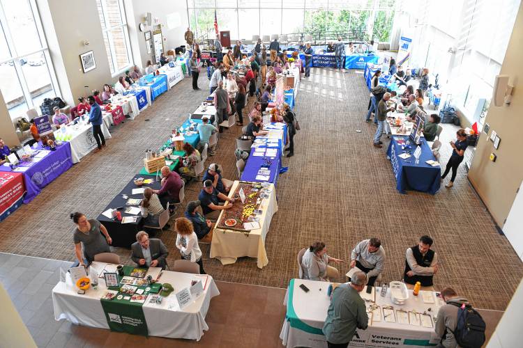 People attend a job fair organized by the MassHire Franklin Hampshire Career Center at Greenfield Community College in Greenfield on Thursday. People attend a job fair organized by the MassHire Franklin Hampshire Career Center at Greenfield Community College in Greenfield on Thursday.
