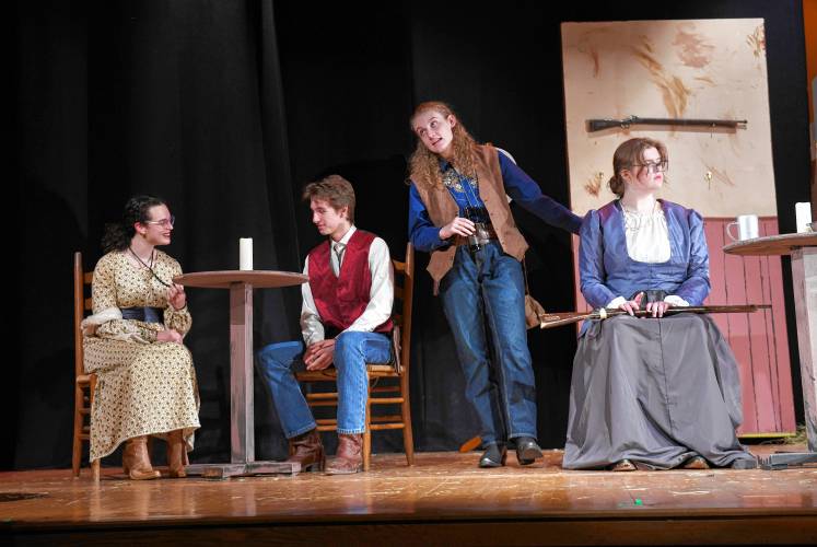 Eliza Van Driesche as Gwendolen, Mason Smith as Jack, Leila Bosman as Algernon and Emily Woods as Lady Bracknell rehearse a scene from “The Importance of Being Earnest” being put on by Frontier Regional School in South Deerfield. Performances start Friday.
