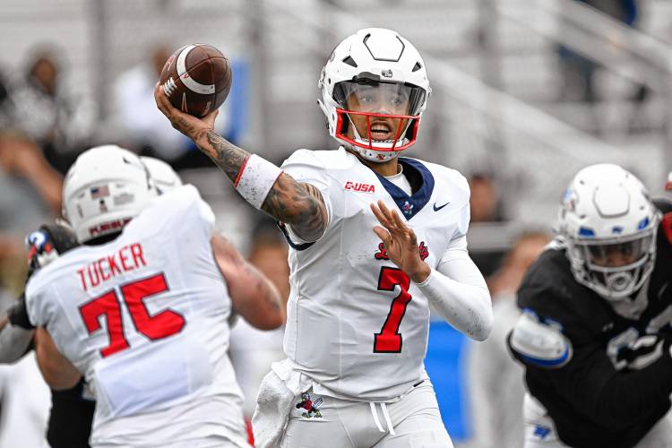Liberty quarterback Kaidon Salter (7) passes against Middle Tennessee during the Flames’ 37-17 victory last weekend in Murfreesboro, Tenn. Liberty quarterback Kaidon Salter (7) passes against Middle Tennessee during the Flames’ 37-17 victory last weekend in Murfreesboro, Tenn.