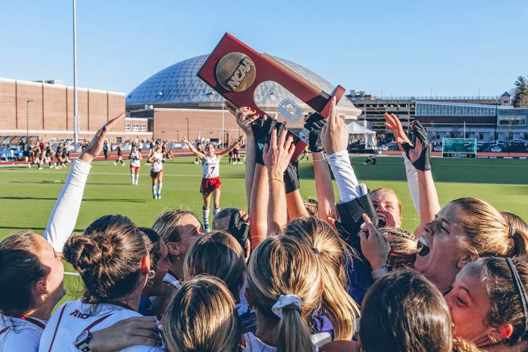 The UMass field hockey team celebrates after beating Harvard to advance to the NCAA Division 1 Final Four last weekend in Storrs, Conn.