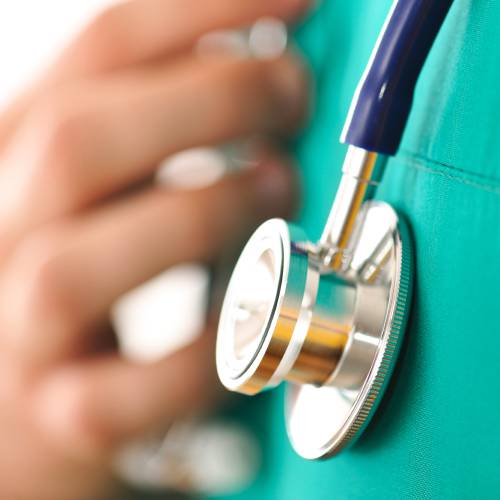 Doctor with stethoscope isolated on white Doctor with stethoscope isolated on white