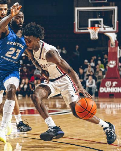 UMass’ Jaylen Curry (0) drives to the basket on a Central Connecticut State defender during the Minutemen’s 73-69 loss to the Blue Devils on Wednesday night at Mullins Center. UMass’ Jaylen Curry (0) drives to the basket on a Central Connecticut State defender during the Minutemen’s 73-69 loss to the Blue Devils on Wednesday night at Mullins Center.