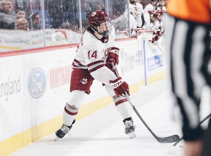 UMass’ Ryan Lautenbach (14) scored the game’s first goal in the Minutemen’s 4-0 win over Boston University on Saturday night at Agganis Arena in Boston. UMass’ Ryan Lautenbach (14) scored the game’s first goal in the Minutemen’s 4-0 win over Boston University on Saturday night at Agganis Arena in Boston.